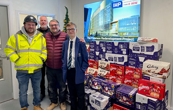 Charlie and the team distribute selection boxes
