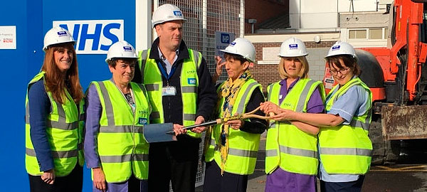 A specially engraved spade was presented to Medway Maritime Hospital from Integrated Health Projects