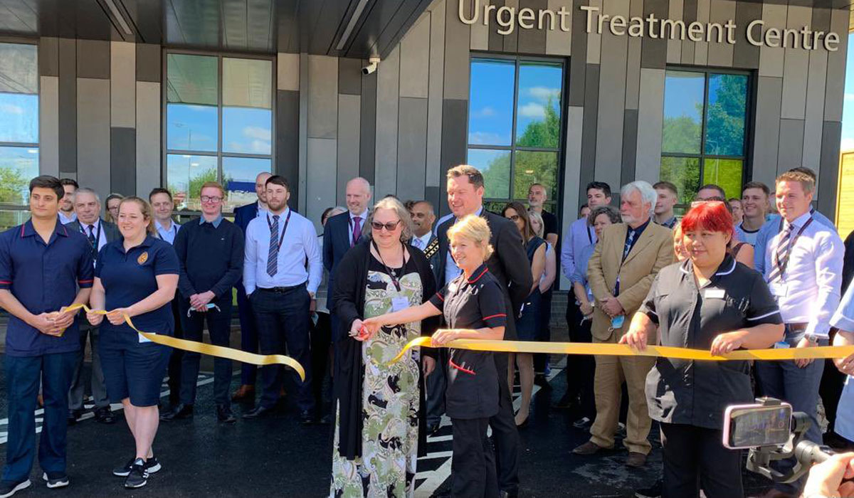 Staff and a patient open the new UTC for Swindon