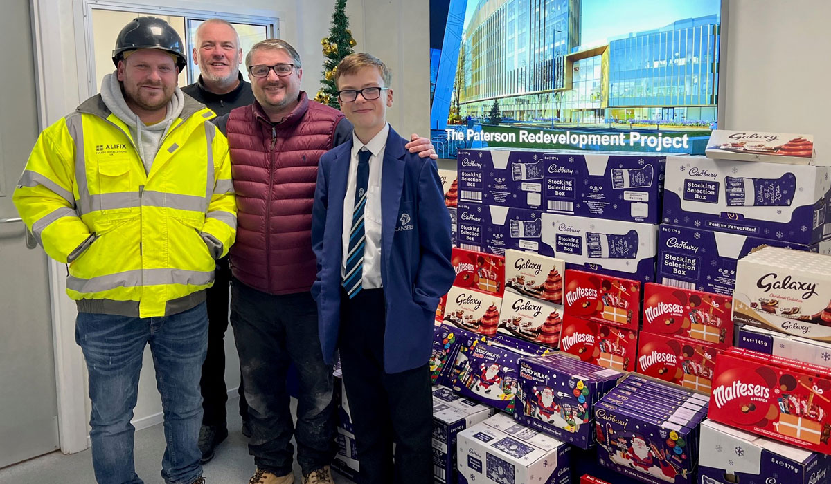 Charlie and the team distribute selection boxes